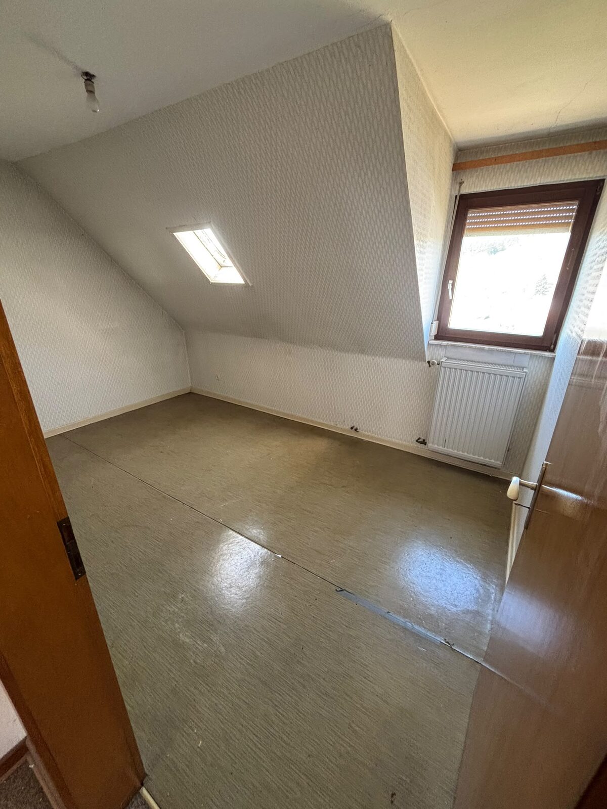 Vollständig geräumter Wohnraum nach der Entrümpelung